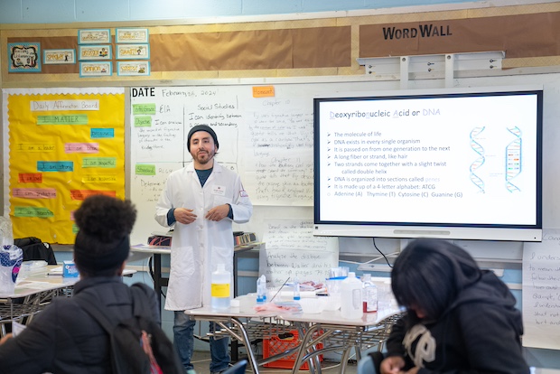 A Temple doctor makes a presentation to middle school students during Careers Day