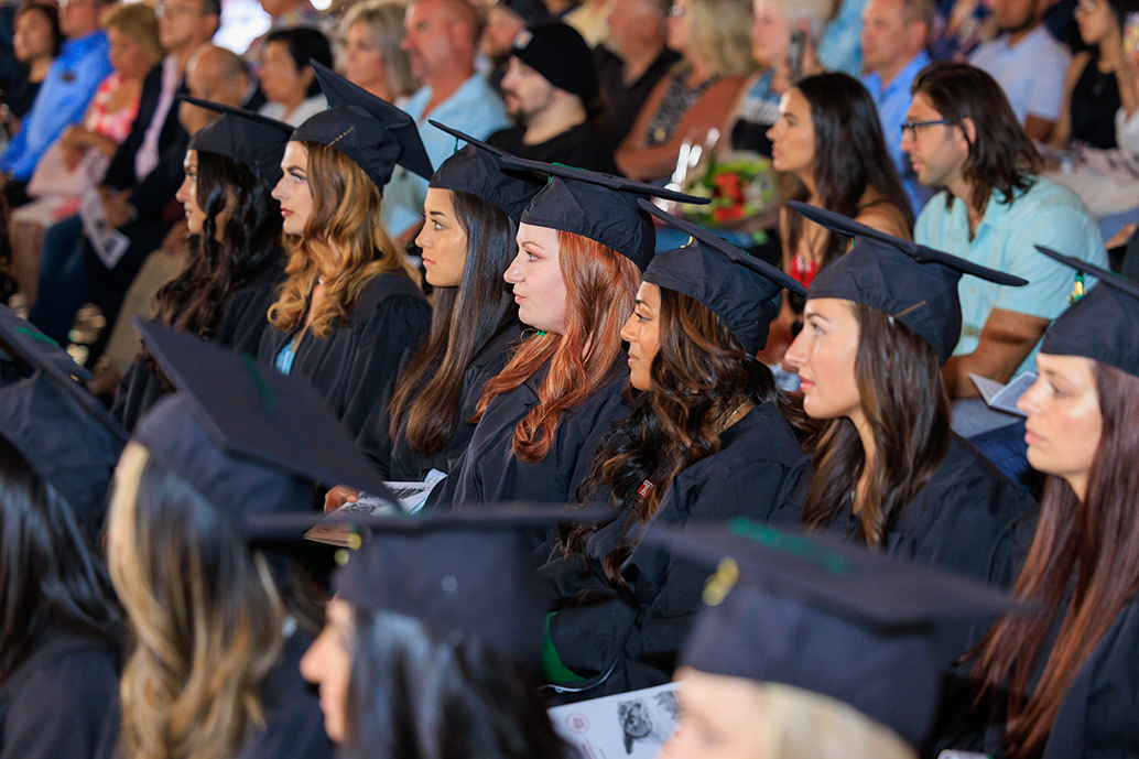 Class of 2022 Physician Assistant Program students sitting at graduation