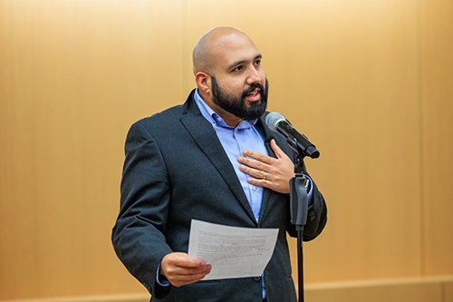 a man presenting his tale at the Story Slam