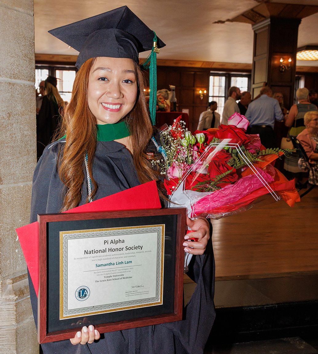 class president Samantha Lam, MMS from the Pysician Assistant Program with her diploma