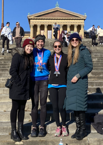 Residents pose on the Philadelphia Art Museum steps after a running event