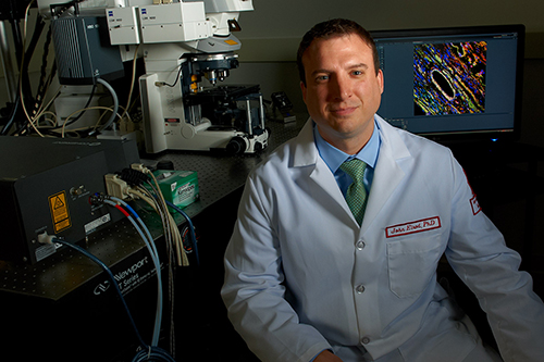 John W. Elrod, PhD in a lab