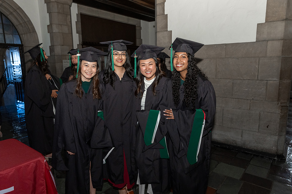 A group of smiling graduates