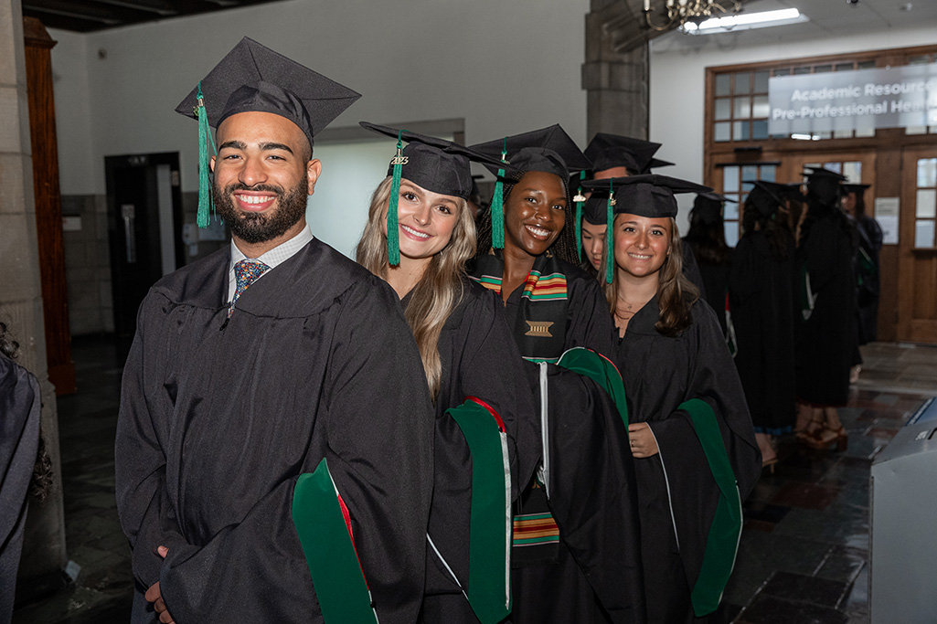 PA Graduates standing in a line and smiling