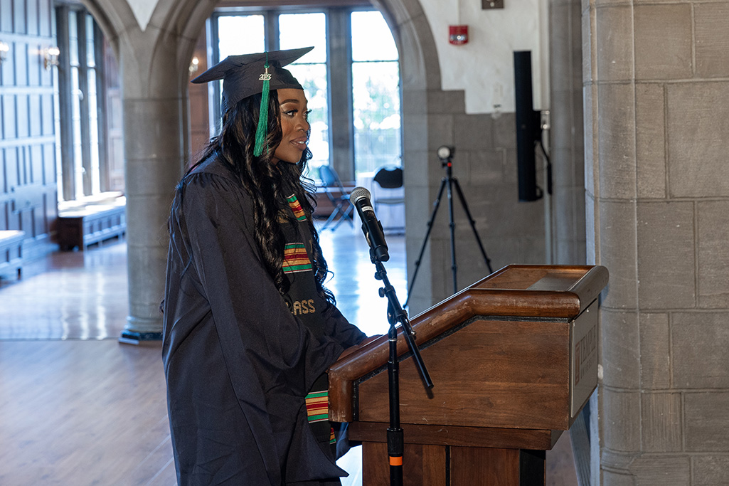 Zobaku Acholonu at the podium during PA Graduation Ceremony 2023