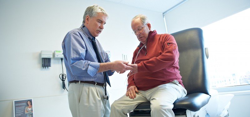 Gerard J. Criner, MD, FACP, FACCP, Chair and Professor of Thoracic Medicine and Surgery examines a patient.