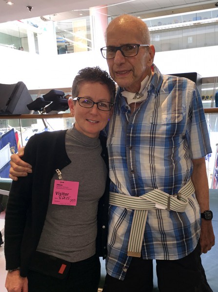 Aaron Levine, in his last day of rehabilitation at a hospital in Washington, D.C. in August, is visited by the surgery chair Amy Goldberg, who led the trauma team at Temple University Hospital that saved his life.