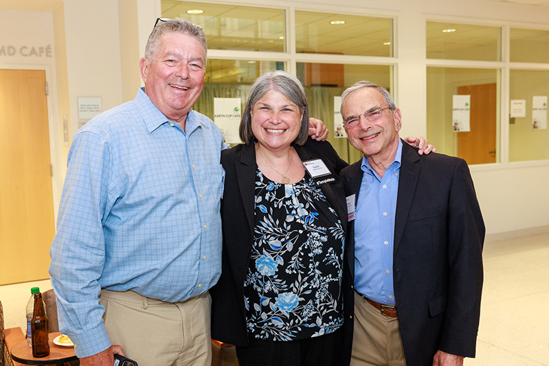 one man, one woman, and another man from the faculty