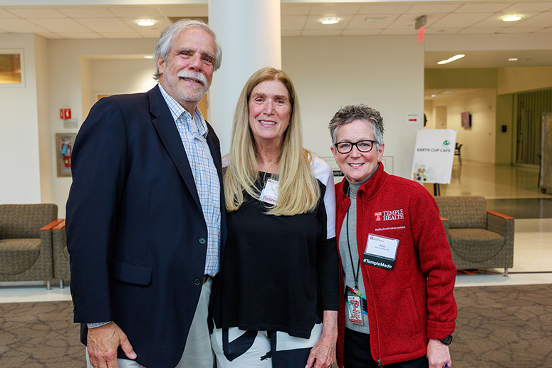 an older man and woman posing with Dean Amy J. Goldberg, MD