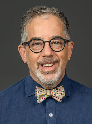 Dr. Lawrence Kaplan