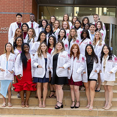 Physician Assistant students in front of the Lewis Katz School of Medicine