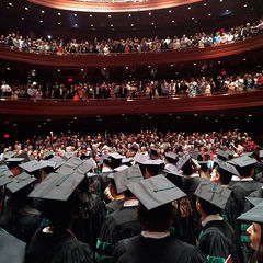 Graduating medical students look into the crowd at the 114th commencement ceremony